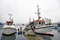 TRA 16 und TRA 17 im Fischereihafen von Lübeck-Travemünde. Hochwasser am 04.01.2024